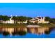 Waterfront building featuring charming architecture and scenic views reflecting in the water at 1021 S Hiawassee Rd # 3922, Orlando, FL 32835