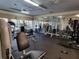 Community fitness center with treadmills, elliptical, and weight machines at 1021 S Hiawassee Rd # 3922, Orlando, FL 32835