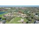 Beautiful aerial view of homes nestled on a golf course with lake views in the distance at 1377 Tappie Toorie Cir, Lake Mary, FL 32746