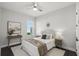 Cozy bedroom with a neutral palette and ample natural light at 1377 Tappie Toorie Cir, Lake Mary, FL 32746