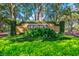 Elegant stone sign at the entrance to Heathrow, surrounded by vibrant greenery and manicured landscaping at 1377 Tappie Toorie Cir, Lake Mary, FL 32746