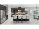 Well-equipped kitchen featuring granite countertops, stainless steel appliances, and a breakfast bar at 1377 Tappie Toorie Cir, Lake Mary, FL 32746