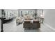 Bright living room boasts modern furnishings, lots of natural light and neutral colors at 1377 Tappie Toorie Cir, Lake Mary, FL 32746