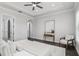 Bright main bedroom with en suite bath and an arched doorway at 1377 Tappie Toorie Cir, Lake Mary, FL 32746