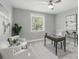 Bright office features neutral paint, two armchairs, a ceiling fan, and a desk at 1377 Tappie Toorie Cir, Lake Mary, FL 32746