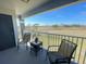 Balcony with chairs and scenic views at 13827 Fairway Island Dr # 1232, Orlando, FL 32837