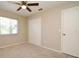 Comfortable bedroom featuring a ceiling fan, closet, and natural light at 1389 Rural Hall St, Deltona, FL 32725