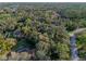 Gorgeous aerial view featuring lush landscaping, a screened pool, and an inviting outdoor space at 140 Sweet Bay Cir, Lake Mary, FL 32746