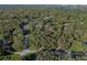 Aerial view of a wooded parcel on a tranquil, tree-lined street at 140 Sweet Bay Cir, Lake Mary, FL 32746