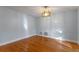 Dining room with hardwood floors and contemporary light fixture at 140 Sweet Bay Cir, Lake Mary, FL 32746