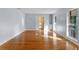 Bright living room featuring hardwood floors, white trim, and natural light at 140 Sweet Bay Cir, Lake Mary, FL 32746