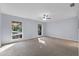 Bright main bedroom with ample natural light from two large windows at 140 Sweet Bay Cir, Lake Mary, FL 32746