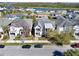 Aerial view of neighborhood featuring well-maintained homes, landscaping, and street parking at 14137 Walcott Ave, Orlando, FL 32827