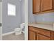 Small half bath with vanity and toilet at 14137 Walcott Ave, Orlando, FL 32827