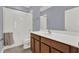 Bathroom features a shower-tub combo, with a single vanity, and neutral finishes for a clean and comfortable space at 14137 Walcott Ave, Orlando, FL 32827