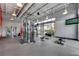 Well-equipped gym featuring modern weight machines and a large window for plenty of natural light and views at 14137 Walcott Ave, Orlando, FL 32827