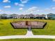 Community playground featuring wooden climbing structure, benches, and surrounding fencing at 14137 Walcott Ave, Orlando, FL 32827