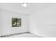 Well-lit bedroom with sleek flooring, a window and neutral paint, perfect for relaxation at 150 Chicago Woods Cir, Orlando, FL 32824