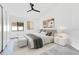 Cozy bedroom with modern furnishings, soft lighting, and minimalist decor, perfect for relaxation and restful sleep at 150 Chicago Woods Cir, Orlando, FL 32824
