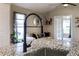 Close-up on a kitchen sink with granite countertops and view of the living area at 1613 N Lakewood Ave, Ocoee, FL 34761