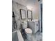 Stylish bathroom with marble tile, modern vanity, and contemporary fixtures at 1920 E Edgewood Dr # A9, Lakeland, FL 33803