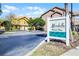 Inviting entrance to Mirabella Residences, featuring well-maintained landscaping and clear community signage at 19914 Villa Creek Dr # 105, Orlando, FL 32821