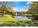 Community with a pond, fountain and beautiful trees to enjoy the outdoors at 19914 Villa Creek Dr # 105, Orlando, FL 32821