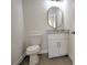 Neat bathroom featuring a white toilet and vanity with stone countertop, offering a clean and functional space at 216 Homewood Dr, Sanford, FL 32773