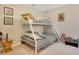 Bedroom featuring bunk beds at 2165 Leather Fern Dr, Ocoee, FL 34761