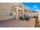 Back patio with neutral paint and updated furniture for entertaining with privacy fence at 2165 Leather Fern Dr, Ocoee, FL 34761