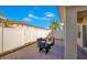 Paved patio area, ideal for outdoor dining and relaxation, features modern patio furniture at 2165 Leather Fern Dr, Ocoee, FL 34761