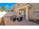Private outdoor space offering an inviting tiled patio with sliding door access to the home at 2165 Leather Fern Dr, Ocoee, FL 34761