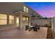 Back patio with neutral paint and updated furniture for entertaining with privacy fence at 2165 Leather Fern Dr, Ocoee, FL 34761