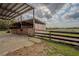 Outdoor view of the horse barn near pasture at 31707 Orange St, Sorrento, FL 32776