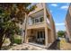Beautiful home exterior with balcony, outdoor kitchen, and well-maintained landscaping at 3191 Brasilia Ave, Kissimmee, FL 34747