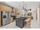 Modern kitchen with a spacious island, stainless steel appliances, and an open floor plan at 3191 Brasilia Ave, Kissimmee, FL 34747