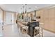 Modern kitchen with a large island, stainless steel appliances, and ample cabinet space at 3191 Brasilia Ave, Kissimmee, FL 34747