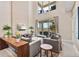 Spacious living room with high ceilings and large windows overlooking the patio at 3191 Brasilia Ave, Kissimmee, FL 34747