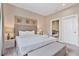 Bright main bedroom featuring a comfortable bed and stylish decor at 3191 Brasilia Ave, Kissimmee, FL 34747