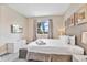 Comfortable main bedroom with large window and neutral decor at 3191 Brasilia Ave, Kissimmee, FL 34747