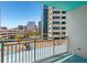 Balcony showcasing views of the city skyline and a nearby parking structure at 322 E Central Blvd # 606, Orlando, FL 32801