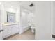 Well-lit bathroom with a shower-tub, vanity, and neutral color palette at 322 E Central Blvd # 606, Orlando, FL 32801