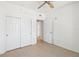 A bedroom with closet space and light-colored floors at 322 E Central Blvd # 606, Orlando, FL 32801