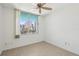 Bright bedroom with a ceiling fan and a scenic cityscape view at 322 E Central Blvd # 606, Orlando, FL 32801