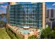 Stunning high-rise residence featuring a large community pool, hot tub and bar at 322 E Central Blvd # 606, Orlando, FL 32801