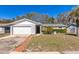 Charming single-story home with a well-manicured lawn and inviting curb appeal at 3708 Pipes O The Glen Way, Orlando, FL 32808