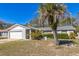 Charming one-story home with mature landscaping in the front yard at 3708 Pipes O The Glen Way, Orlando, FL 32808