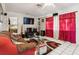 Cozy living room with tile flooring, an area rug, and an entertainment center at 3708 Pipes O The Glen Way, Orlando, FL 32808