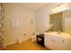 Bathroom with a shower-tub combo, toilet, and vanity with ample counter space at 4814 Cayview Ave # 407, Orlando, FL 32819