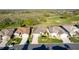 An aerial view of pristine homes and golf course community at 5025 St Andrews Arc, Leesburg, FL 34748